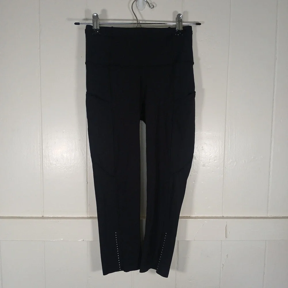 Lululemon Speed Up Crop Leggings Womens 2 Black High Rise Pockets Reflective